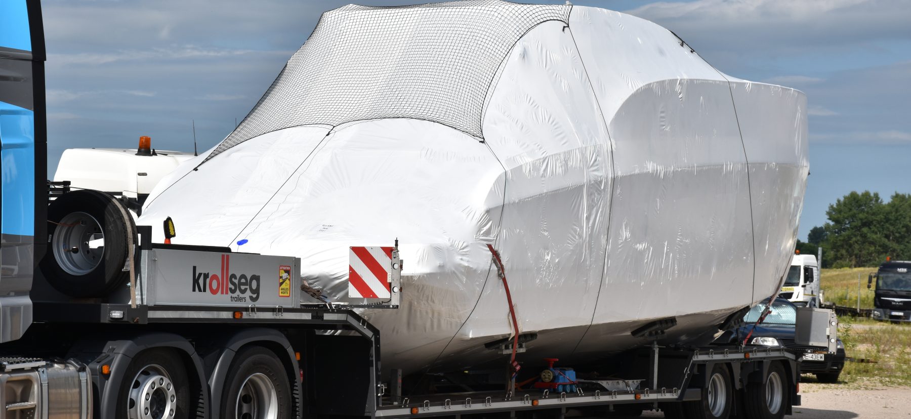 Yachts secured for transport on NEW MBK trailers